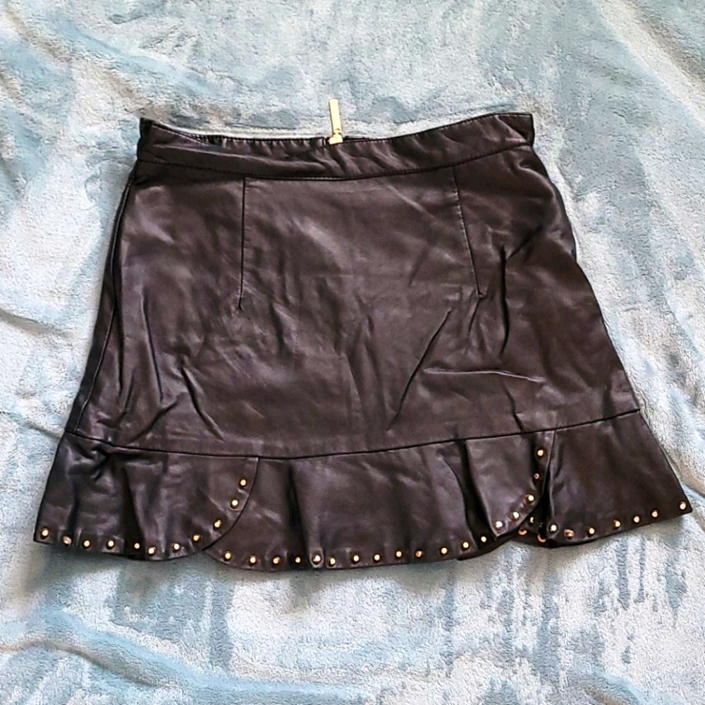 Mini leather like skirt black gold studded